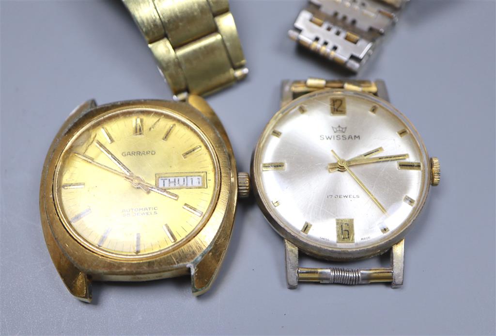 Five assorted wrist watches including Garrard & Rotary.